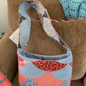 Handmade with a vintage quilt top purse